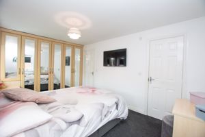 Bedroom One- click for photo gallery